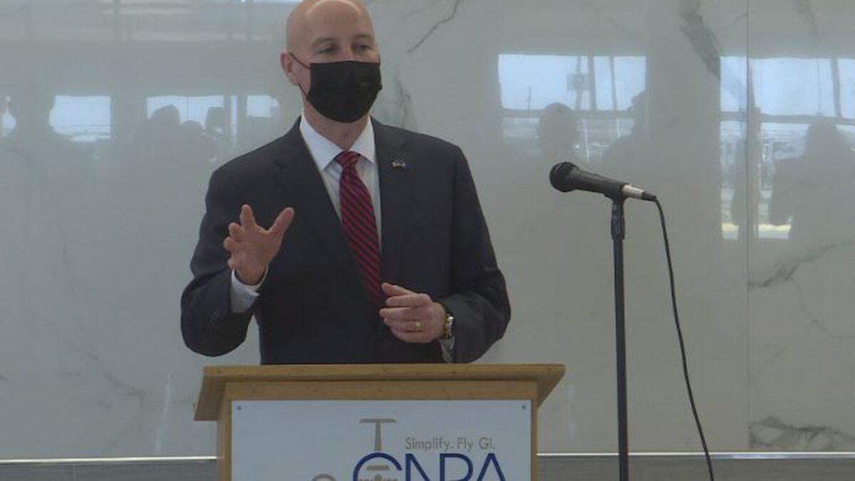 Gov. Pete Ricketts speaking about budgeting goals at Central Nebraska Regional Airport Thursday...